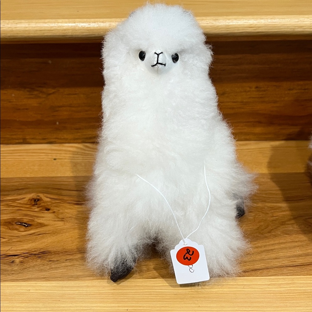 # 23 100% alpaca fur 9 “